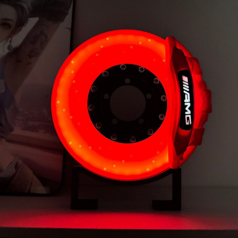 Stemningsbelysning i Brembo-bremsedesign med integreret trådløs opladning