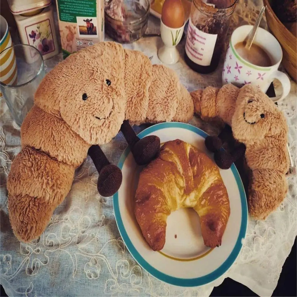 Croissnuggle - Blød Krammebamse I Croissantform
